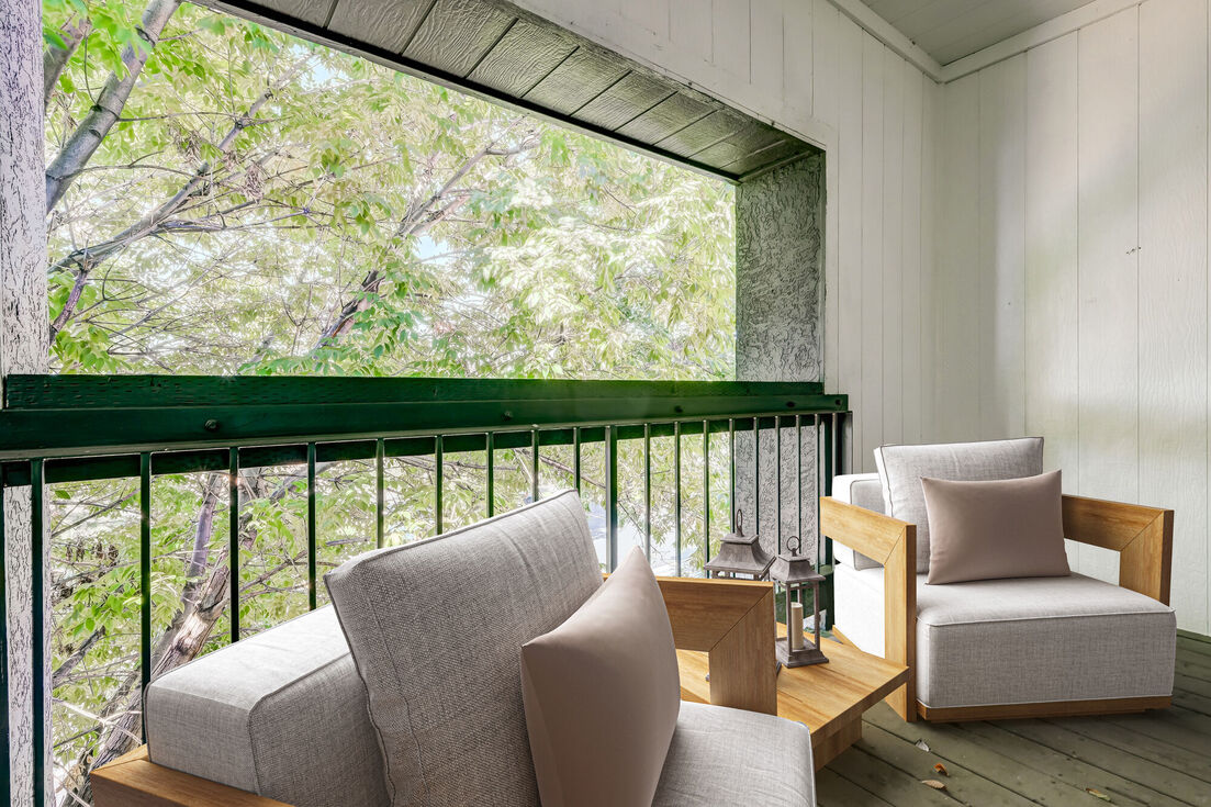 Balcony with chairs and table